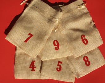 24 pockets or pouches braided mesh type burlap with numbers 1 to 24 for advent calendar