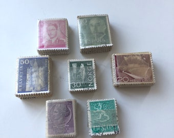 Vintage stamps in little piles
