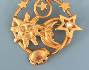Vintage cosmic sun moon & star brooch