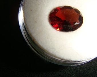 Spessartite garnet faceted 8 x 10 mm oval 2.02 carats