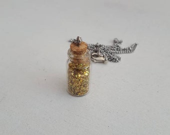 Gold stardust necklace.
