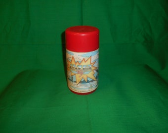 One(1), 1986, Lazer Tag Thermos, from Aladdin Industries.