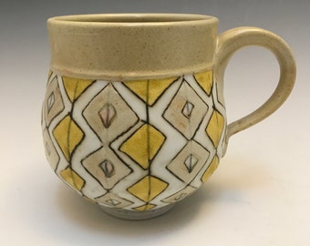 Wheelthrown porcelain mug in yellow and diamonds