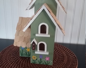 Green and White Birdhouse