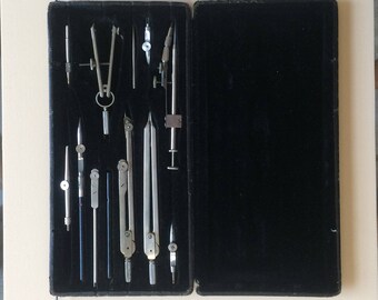 Vintage set of geometry compassses, in original padded box. From Switzerland.