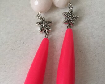 Pendant earrings with jade and bead-drop beads.