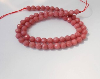 set of 2 natural 6 mm faceted Rhodonite beads. (RHODOFAC6mm)