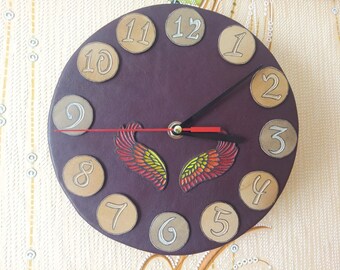 Wall clock made of leather with wings,leather goods