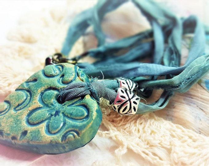 Blue green ceramic heart pendant neckace with sari ribbon. Hippy boho jewellery. Bohemian handmade festive ware. Tibetan silver jewelry.