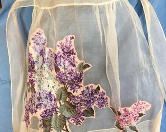 Vintage hostess apron, sheer with lilac appliqué and pocket