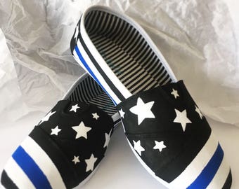 Blue line slip ons! | police | law enforcement | policeman | blue | black | stars | american flag | American | shoes | fashion | US | cops
