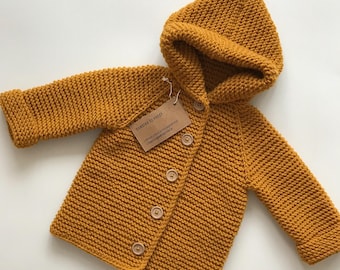 Hand knitted baby cardigan