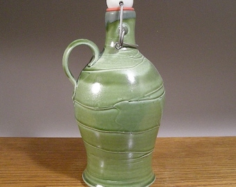 Handmade Custom Wide Top Craft Beer Stoneware Pottery Flip Top Beer Growler / Howler With Slip and Layered Glaze Decoration.