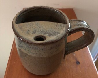 Brown and yellow mustache mug