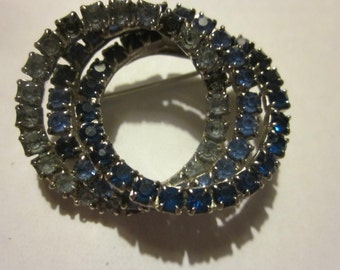 triple rhinestone circle pin. shades of blue rhinestones, circle pin 1 1/2"