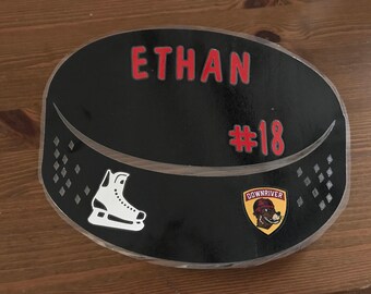 Hockey puck sign hotel doors tournament