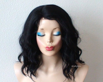 Black wig. Beach wavy hairstyle wig. Short wig. Durable heat friendly synthetic hair wig for everyday wear or Cosplay.