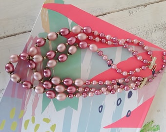 Vintage pink plastic bead necklace