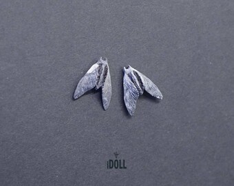 Earrings with a gray small moth. 1 pair.