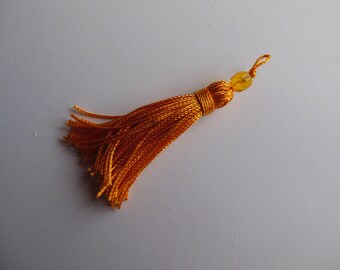 Tassel has sunny yellow bead