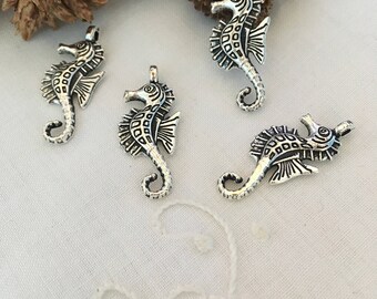 4 seahorses, finely crafted, antique silver charms pendants