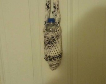 Hand knit mesh water bottle holder.