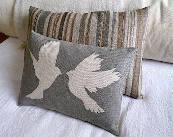 hand printed greys bird cushion