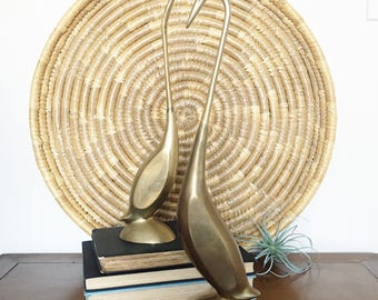 Set of 2 brass cranes in great vintage condition. Both have been polished since photo was taken.