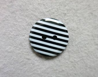 Black and white striped button