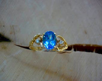 14kt. Gold Blue Topaz and diamond Ring
