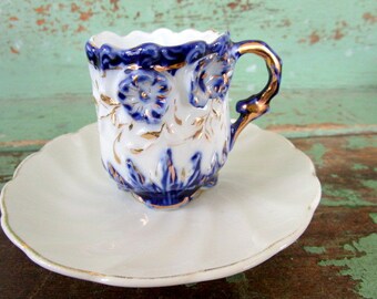 Vintage Demitasse teacup saucer Cobalt blue raised flowers