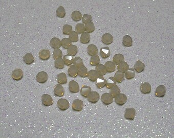 SWAROVSKI SAND OPAL 4MM BICONE BEAD