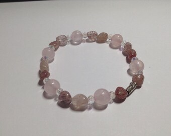 Love Glow. Leprocrocite and rose quartz beads with crystals and karen hill tribe silver bracelet.