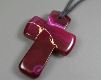 Kintsugi (kintsukuroi) magenta banded agate cross pendant with gold repair on black cotton cord - OOAK