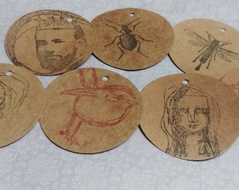 7 Assorted Stamped Disc Tags