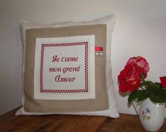 Pillow cover with cross stitch embroidery on white canvas
