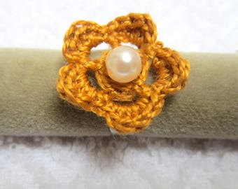 This beautiful ring with a crochet flower