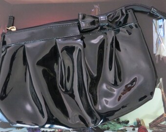 Very cute patent leather clutch