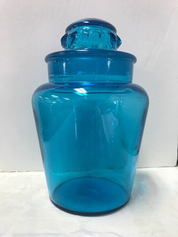 Blue apothecary jar with lid