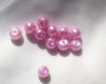 15 pink pearls are clear glass 4mm
