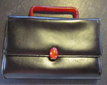 vintage little purse lucite handle and clasp very nice and unusual