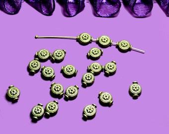 10 round beads patterned 10x06mm color bronze