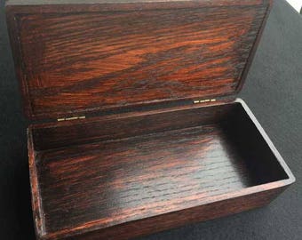 Solid oak box with hinged lid. Perfect for jewelry, keepsakes, trinkets, incense, or just about anything!