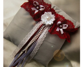 Red/Burgundy Garter, flower to be white, and white bow