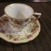 Vtg Old Small tea cup and saucer Gold Catile Made in Japan Saucer 4.5 and Cup 2.5 Inches Rose Floral Design with Gold Trim Minor wear