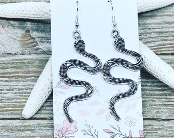 Tibetan silver snake earrings.