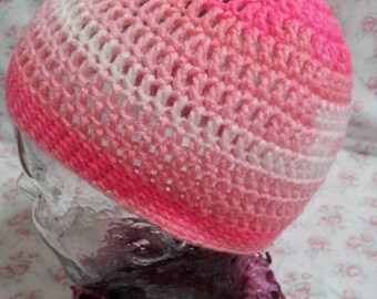 Crochet beanie hat in pink and white wool