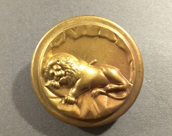 The Lion of Lucerne button.