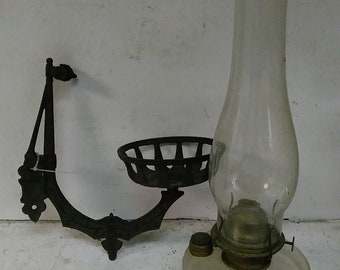 Antique kerosene or oil lamp and holder