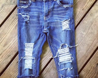 Farm girl ripped and distressed denim jeans